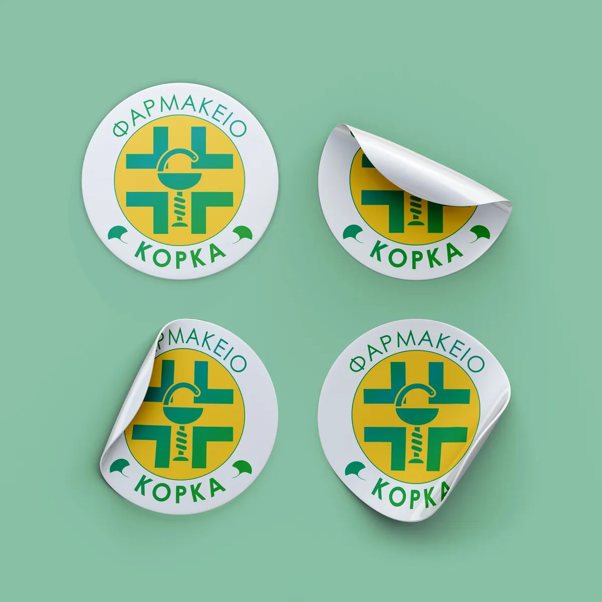 Korka Pharmacy stickers, a green cross in a yellow circle