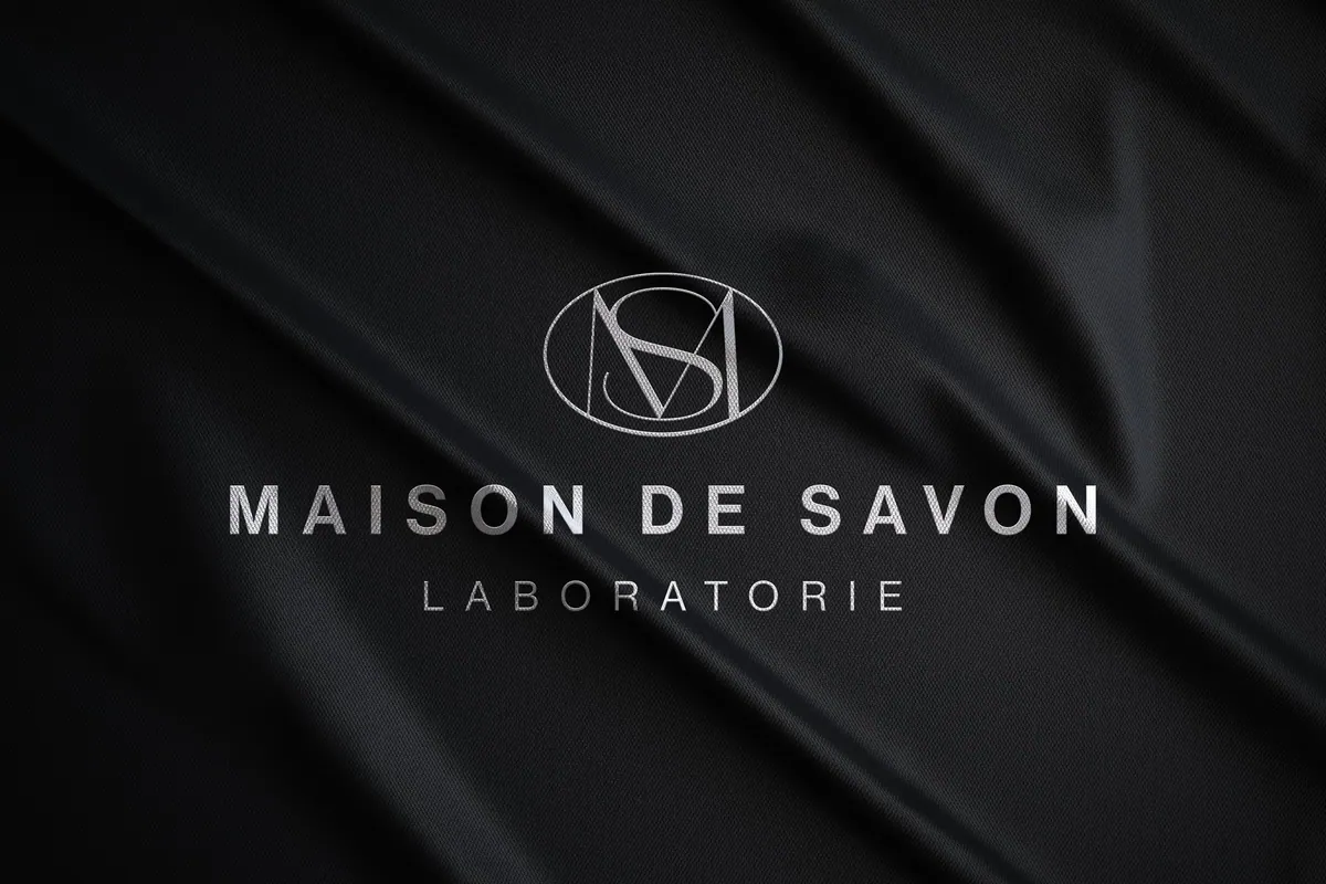 Maison de Savon Laboratoire logo on black fabric