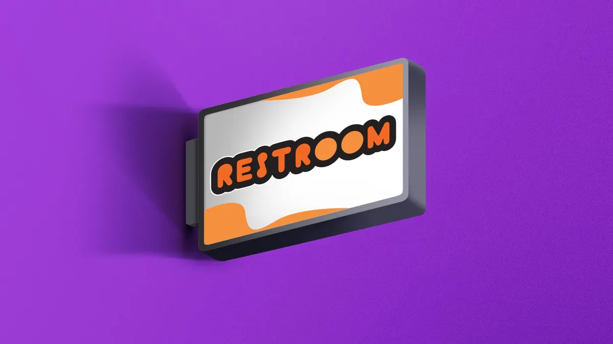 Φωτεινή πινακίδα Restroom σε πορτοκαλί